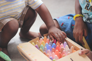 kids playing with chalk