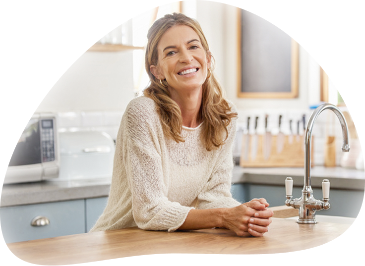Happy woman in kitchen