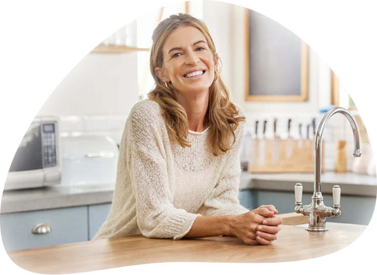 Happy Woman in Kitchen