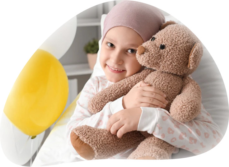 Child in hospital with teddy bear